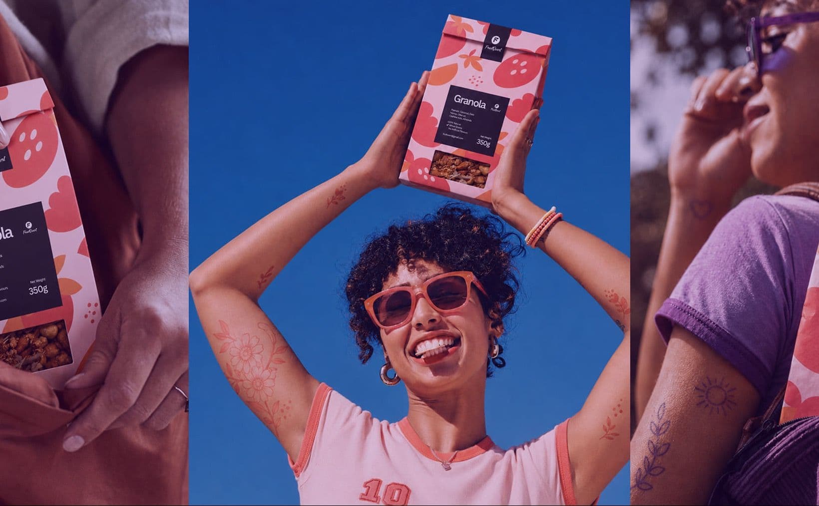 A woman in red sunglasses holding a FruitOvert granola box overhead